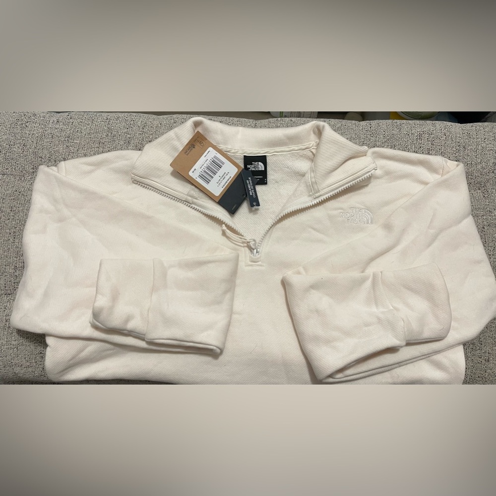 Cream North Face sweatshirt with zipper